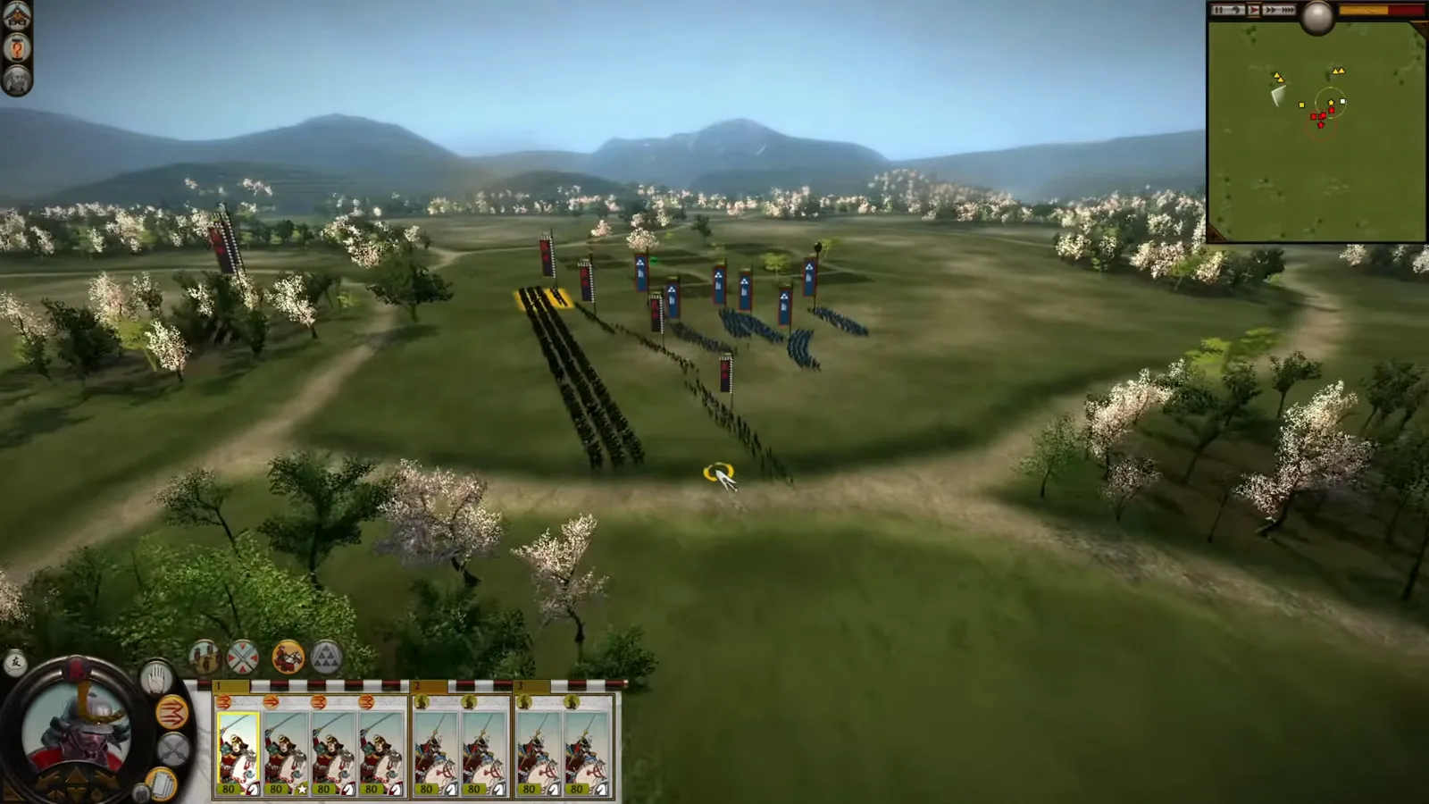 Dismounted Katana Cavalry advances toward blue-bannered infantry in Shogun 2 while a separate mounted group waits to approach the flank.