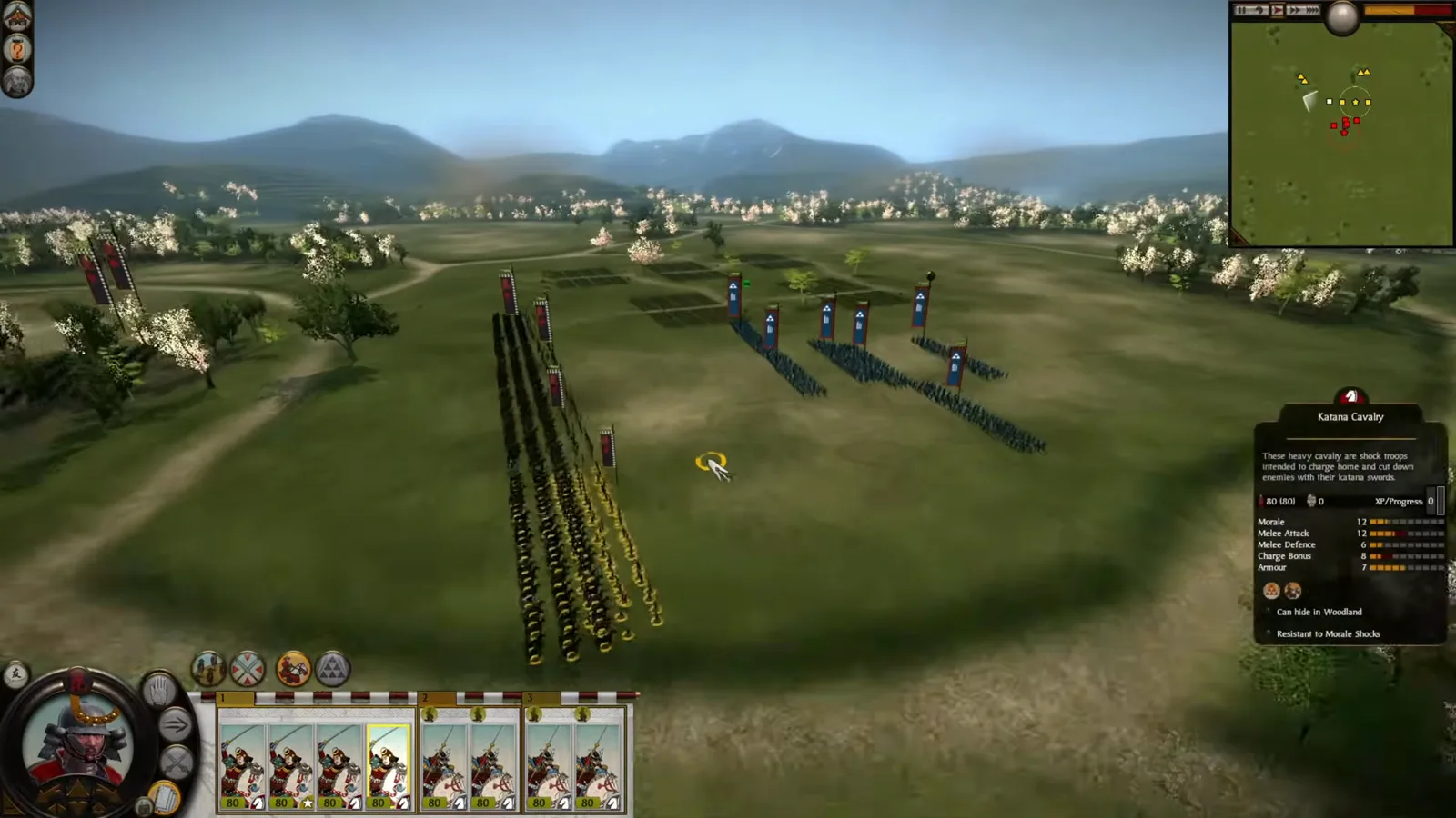 Classic Shogun 2 selected Katana Cavalry stands dismounted in a long line with riderless horses behind it before engaging spear infantry.