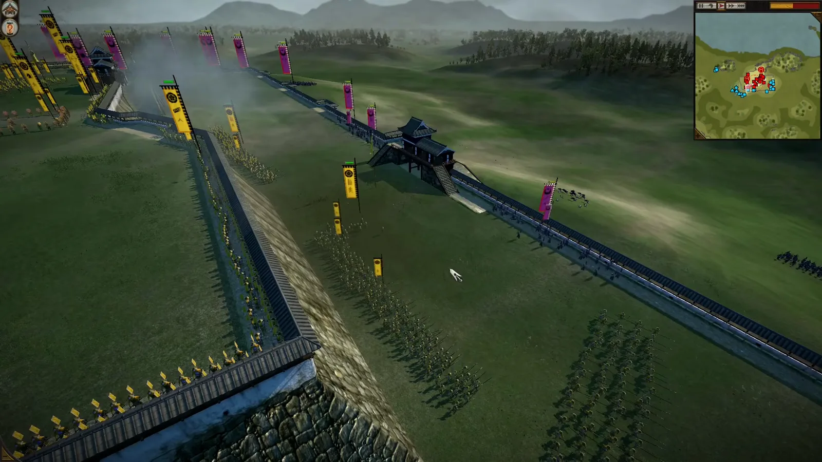 A classic Shogun 2 castle defense with archers on the upper rampart and infantry drawn up below the wall beside a gatehouse. A classic Shogun 2 castle defense with archers on the upper rampart and infantry drawn up below the wall beside a gatehouse.