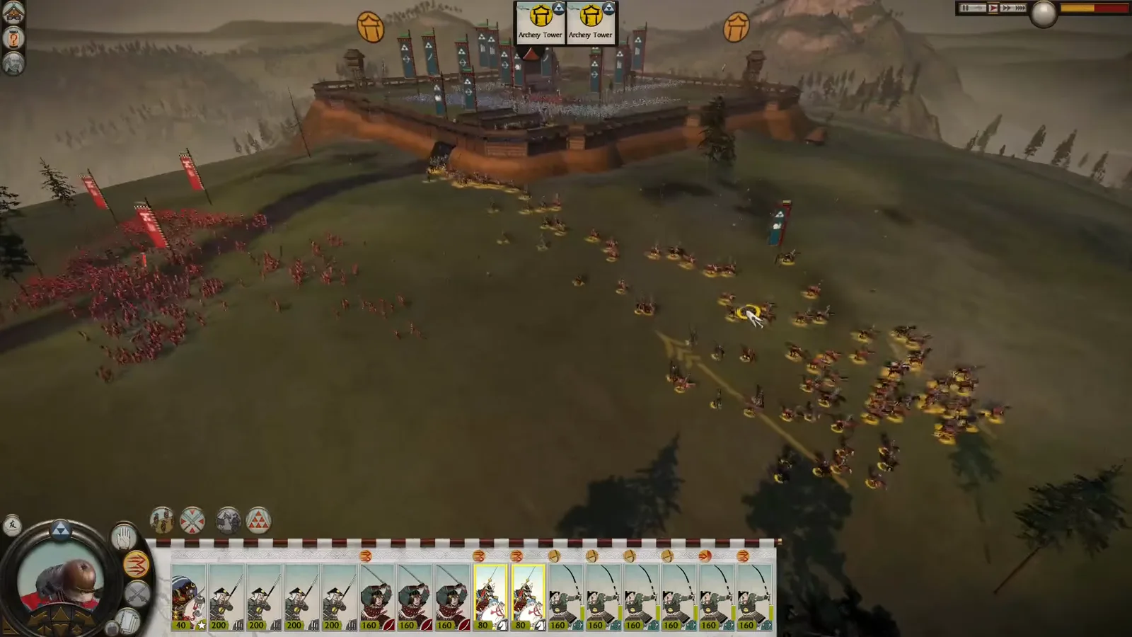 Classic Shogun 2 cavalry ride outside a castle toward enemy infantry while the defenders remain behind the walls.